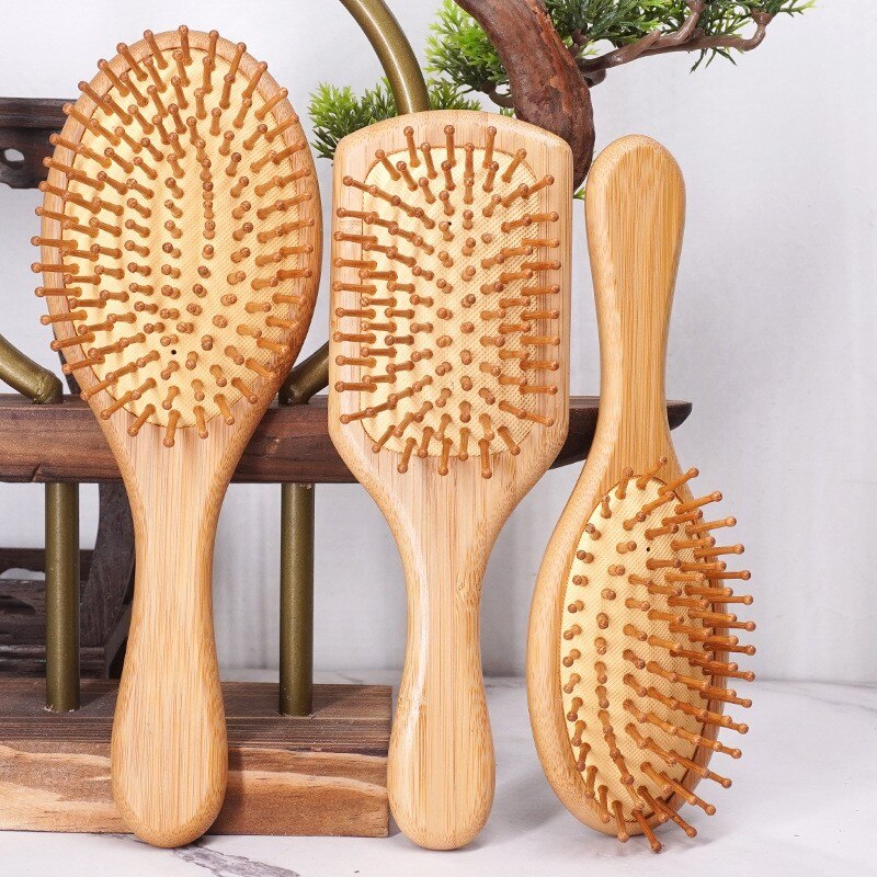 Brosse à cheveux pour femmes avec effet massant en bambou